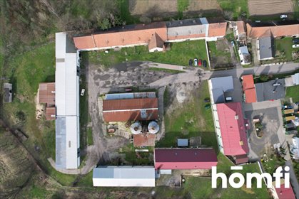 Do sprzedania magazyn inwestycyjny 1600 m² z silosami i biurem magazyn Bielice