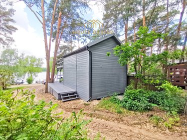 Urokliwy domek nad jeziorem z tarasem i klimatyzacją dom Grzybowo