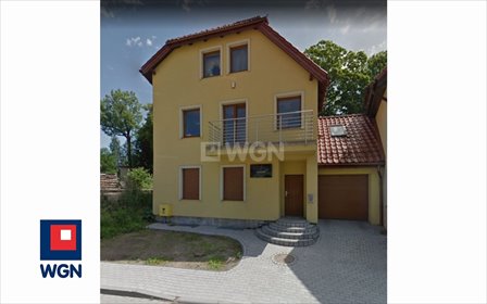 Na sprzedaż przestronny dom z 3 niezależnymi apartamentami i garażem dom Bartoszyce, Warmińska