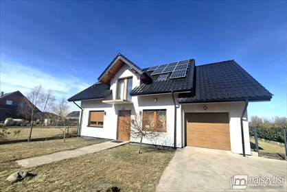 Nowoczesny dom z pompą ciepła i fotowoltaiką, ogród dom Nowogard, Obrzeża miasta