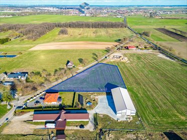 Działka inwestycyjna 7635 m² z MPZP, media, 134 m frontu działka Pierławki