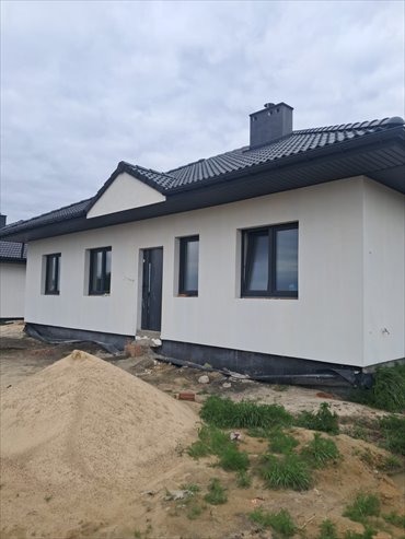 Nowoczesny dom 95,91 m² z ogrzewaniem podłogowym i kominkiem dom Opatówek, Zduny