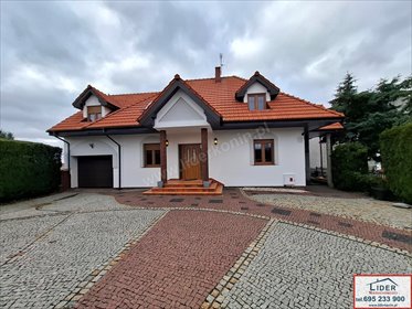 Przestronny dom 110 m² z garażami i ogrodem w Posadzie dom Konin, Chorzeń