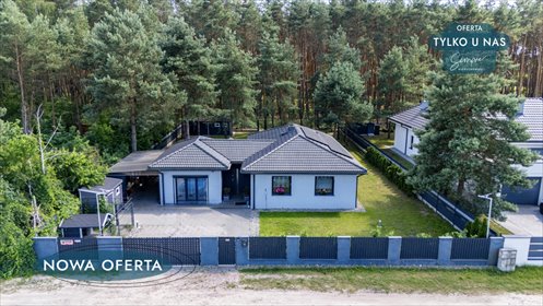 Nowoczesny dom parterowy 121 m² z fotowoltaiką i kominkiem dom Stary Adamów, Działkowa