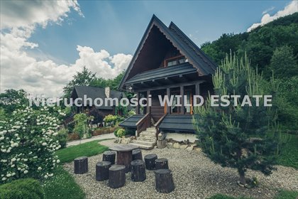 Urokliwe siedlisko pod lasem - dom 188 m² + 2 domki rekreacyjne dom Solina, Wołkowyja