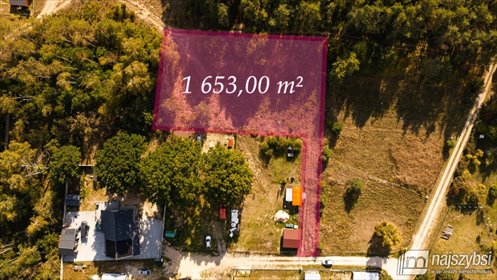 Do sprzedania działka 1653 m² w Komarowie z budynkiem i garażem działka Komarowo