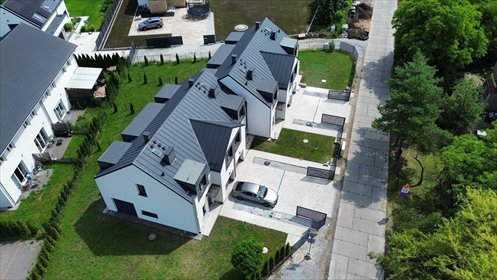 Nowoczesny dom bliźniak z garażem i pompą ciepła dom Biestrzyków