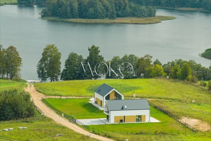 Nowoczesny dom nad jeziorem z prywatną plażą i tarasem dom Zabielne