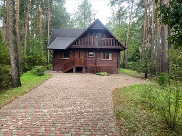 Na sprzedaż działka z drewnianym domem letniskowym 100 m² w Dziektarzewie dom Dziektarzew, Spacerowa