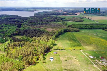 Działka budowlana 3001 m² pod lasem nad jeziorami Mazurskimi działka Giżycko, Kamionki