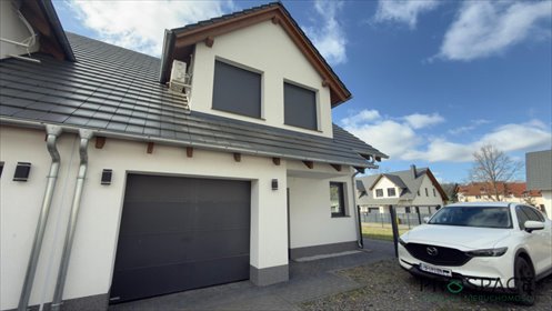 Nowoczesny dom bliźniak z garażem, 4 sypialnie, klimatyzacja dom Gubin, Okrężna