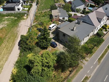 Przestronna działka 2357 m² z budynkiem 120 m² - potencjał działka Kościan