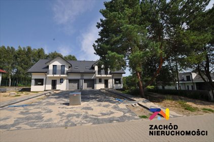 Przestronny dom bliźniak z garażem i dużą działką. dom Droszków