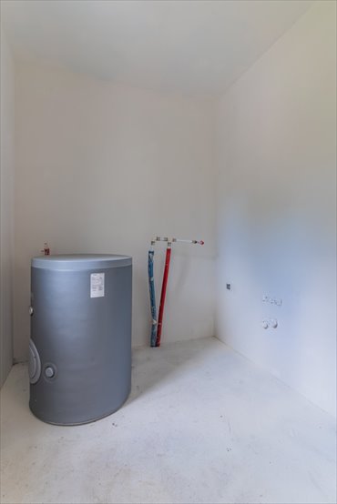 Nowoczesny dom bliźniak z garażem i pompą ciepła dom Biestrzyków