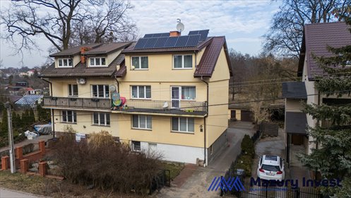Dom z 4 mieszkaniami, garażami i fotowoltaiką polecam dom Szczytno, Kochanowskiego