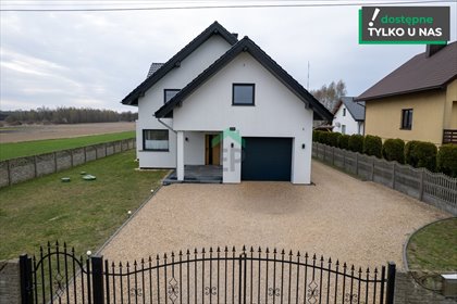 Nowoczesny dom z kominkiem, fotowoltaiką i ogrodem dom Truskolasy