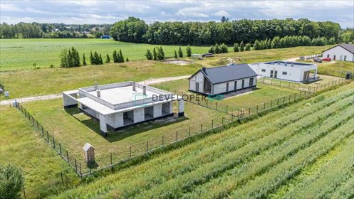 Nowoczesny dom w stanie surowym z dużymi przeszkleniami dom Komorowo, Sadowa