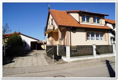 Sprzedam przestronny dom z garażami i ogrodem w Giżycku dom Giżycko, Wiejska