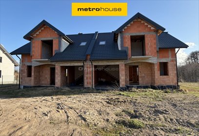 Połowa bliźniaka z garażem, stan surowy otwarty dom Mława, Rachockiego