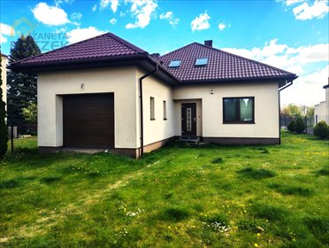 Dom z garażem i tarasem w Kampinosie – 125,52 m2, ogrzewanie ekogroszkiem dom Kampinos, Partyzantów