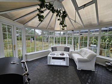 Nowoczesny dom z ogrodem zimowym i garażami, 80 m² dom Tanowo, Sosnowa