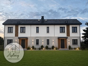 Dom bliźniak z podwójną ścianą i ogrzewaniem podłogowym dom Krosno, Kamienna