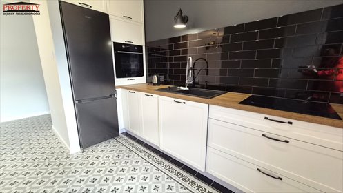 Nowoczesny 2-pokojowy apartament z dużym balkonem i miejscem w Łodzi mieszkanie Łódź, Śródmieście, rejon REWOLUCJI/UNIWERSYTECKA