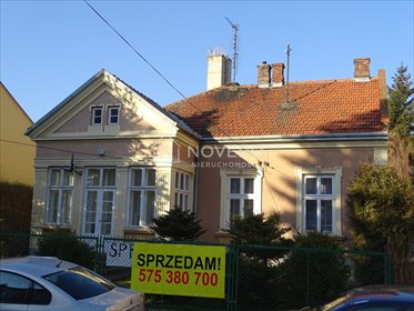 Przestronny dom z cegły, weranda, garaż i potencjał. dom Jarosław