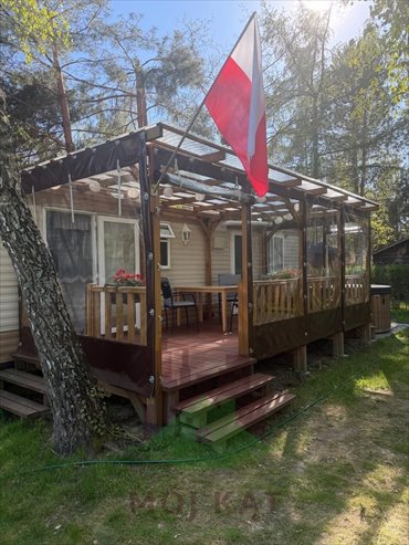Urokliwy domek holenderski 42 m² nad jeziorem Rotcze dom Grabniak