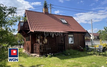 Urokliwe siedlisko z drewnianym domkiem i ogrodem dom Wróblew, Wróblew