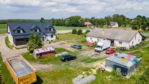 Do sprzedania przestronny dom z tarasem i potencjałem inwestycyjnym lokal użytkowy Pasłęk