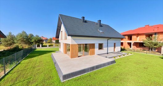Nowoczesny dom 200 m² z panoramicznymi oknami (taras, kominek) dom Rajszew