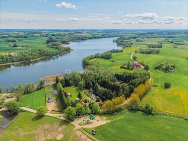 Działka nad jeziorem z domkami i infrastrukturą działka Barcie