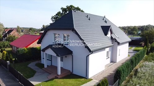 Pensjonat z 4 niezależnymi mieszkaniami i domkiem letniskowym dom Żarnowska, Rolna