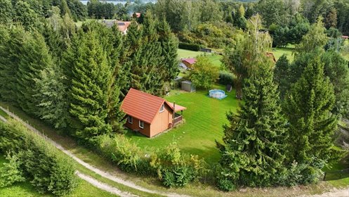 Do sprzedania działka 1286 m² z domkiem i dostępem do prywatnej plaży działka Malinówka Wielka
