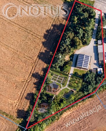 Na sprzedaż przestronna działka 2427 m² z domem i garażami działka Paczynka