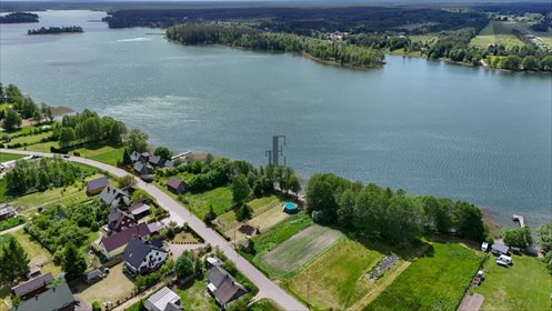 Sprzedam przestronny dom i działkę nad jeziorem Serwy działka Mołowiste