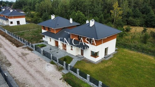 Nowoczesny dom bliźniaczy 142m2 z ogrzewaniem podłogowym dom Chylice, Alpejska