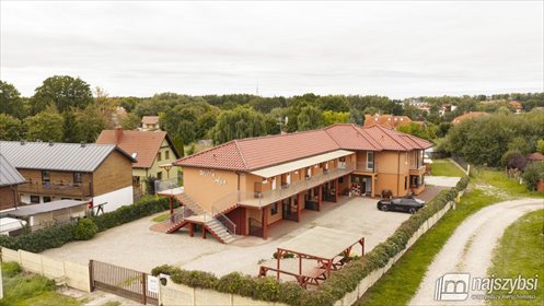 Atrakcyjny ośrodek w Rewalu z 80+ miejscami noclegowymi. dom Rewal