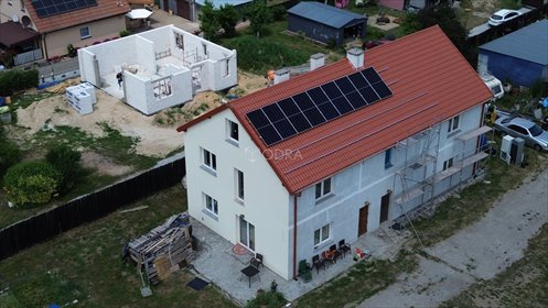 Przestronny dom z fotowoltaiką, 2 adresami i dużą działką dom Łęg