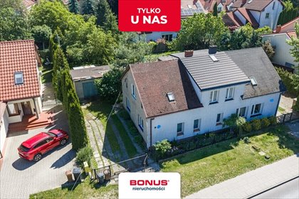 Dom bliźniak z dużym garażem i potencjałem do własnej aranżacji dom Szczecin, Gumieńce