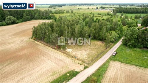 Działka budowlana w Kozikach z drzewami i ogrodzeniem działka Ełk, Koziki